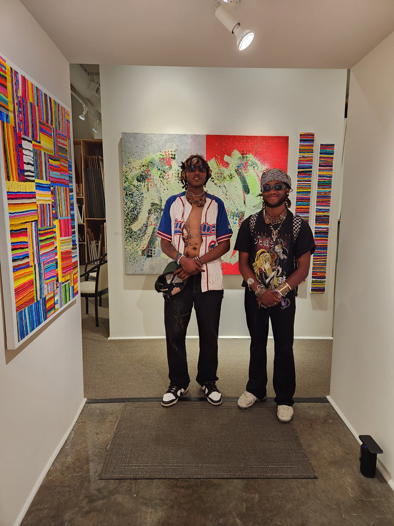 Creatively dressed visitors at the gallery