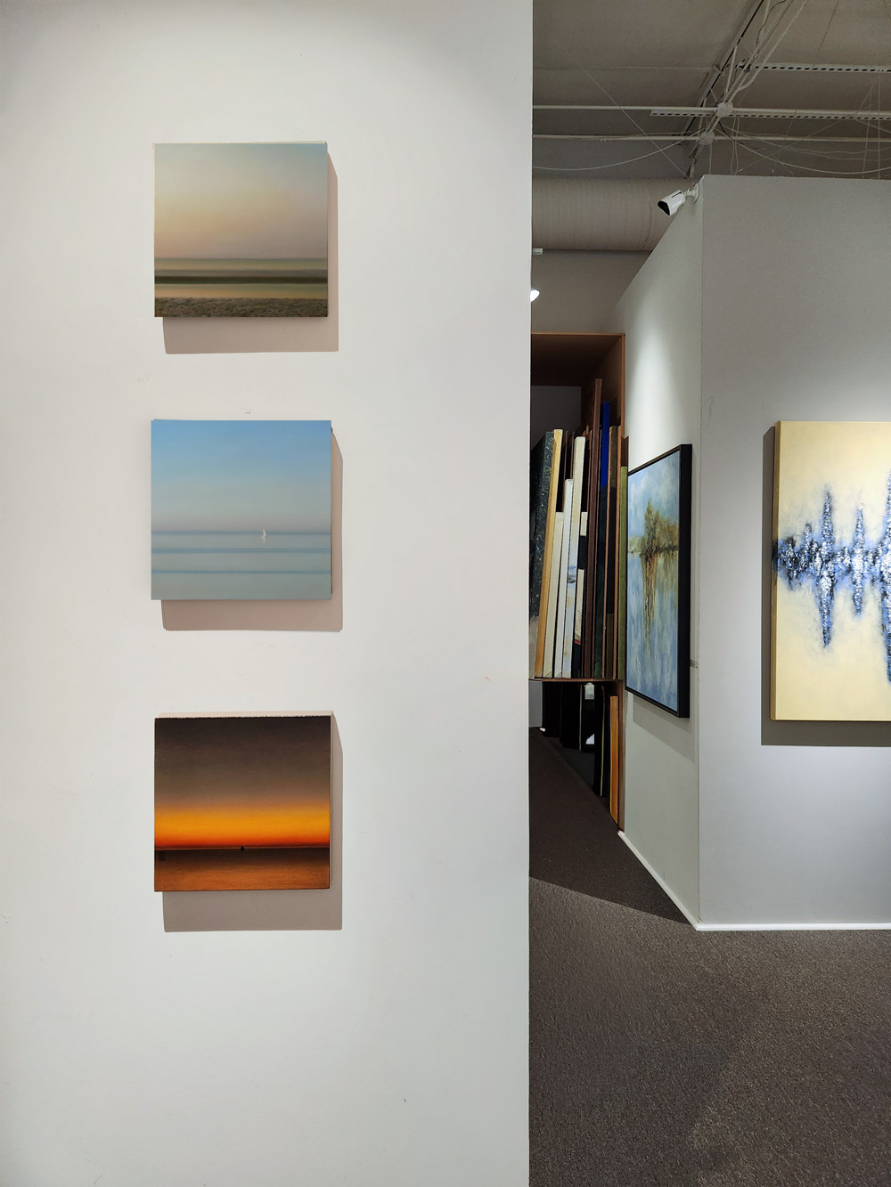 "Lake of Dawn" with two other paintings by Peter J. O'Halloran