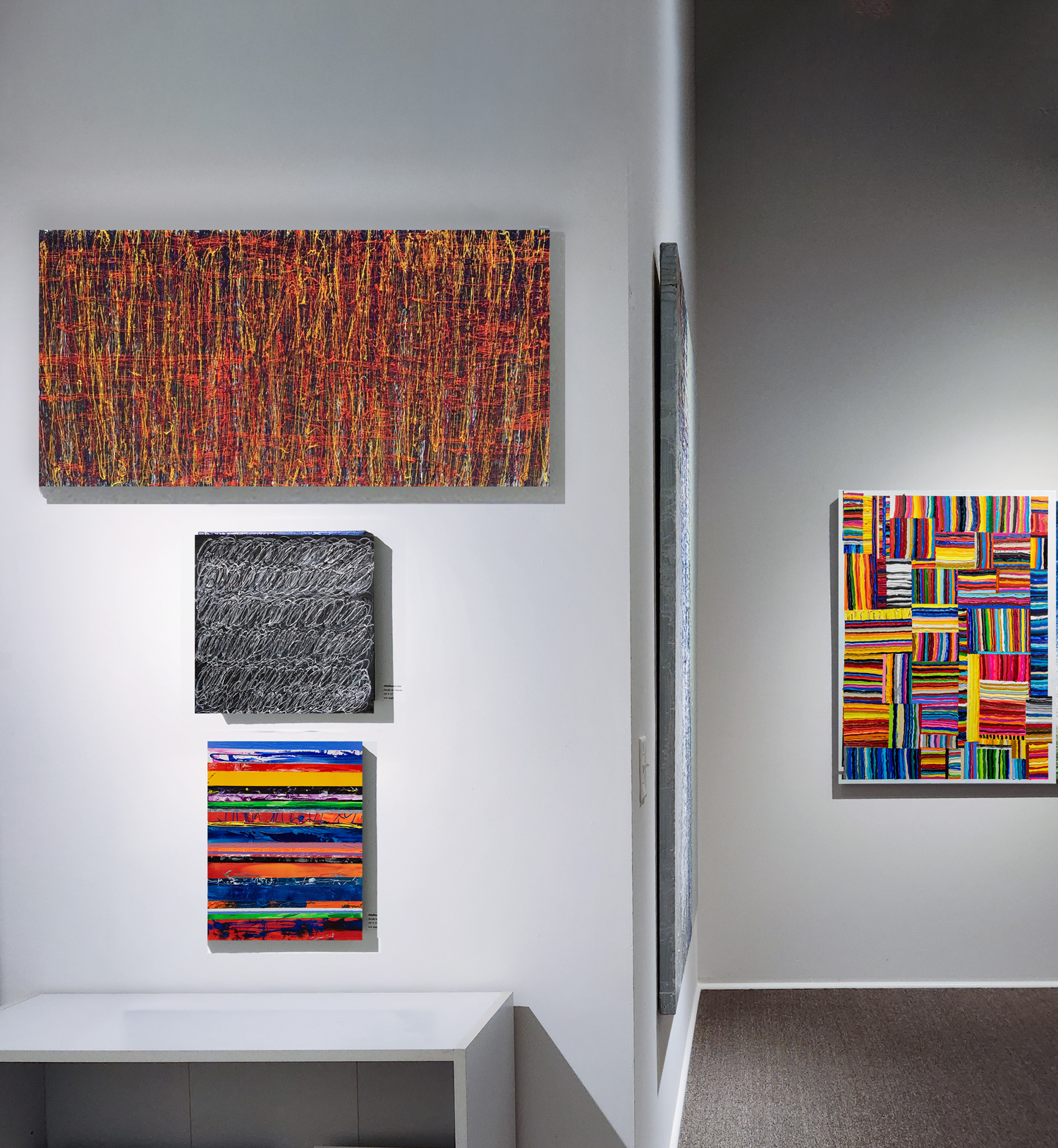 "Rhythm Graphite #1" hanging with other paintings by w.e. pugh