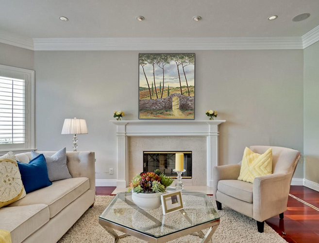 "Passing Through" painting displayed in a room setting with neutral decor